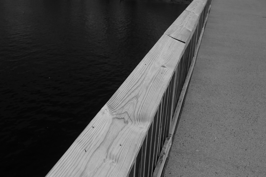 Strongly Graphical Photo of Wooden Bridge Rail in Diagonal.